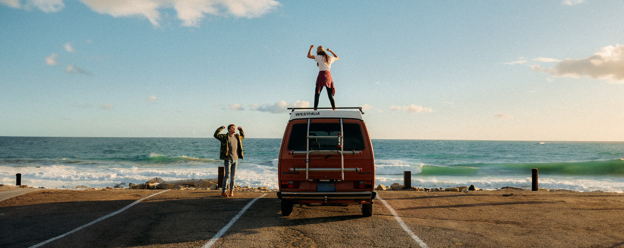 Lifestyle photographer Caleb Kuhl photographs beach sunsets with a Westfalia van