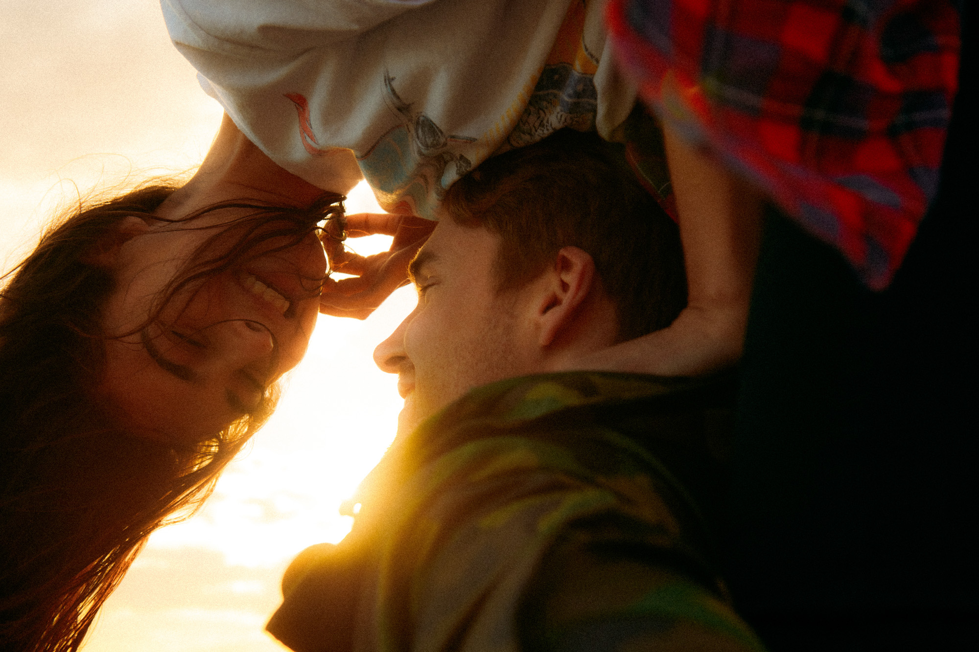 Lifestyle photographer Caleb Kuhl photographs beach sunsets with a Westfalia van