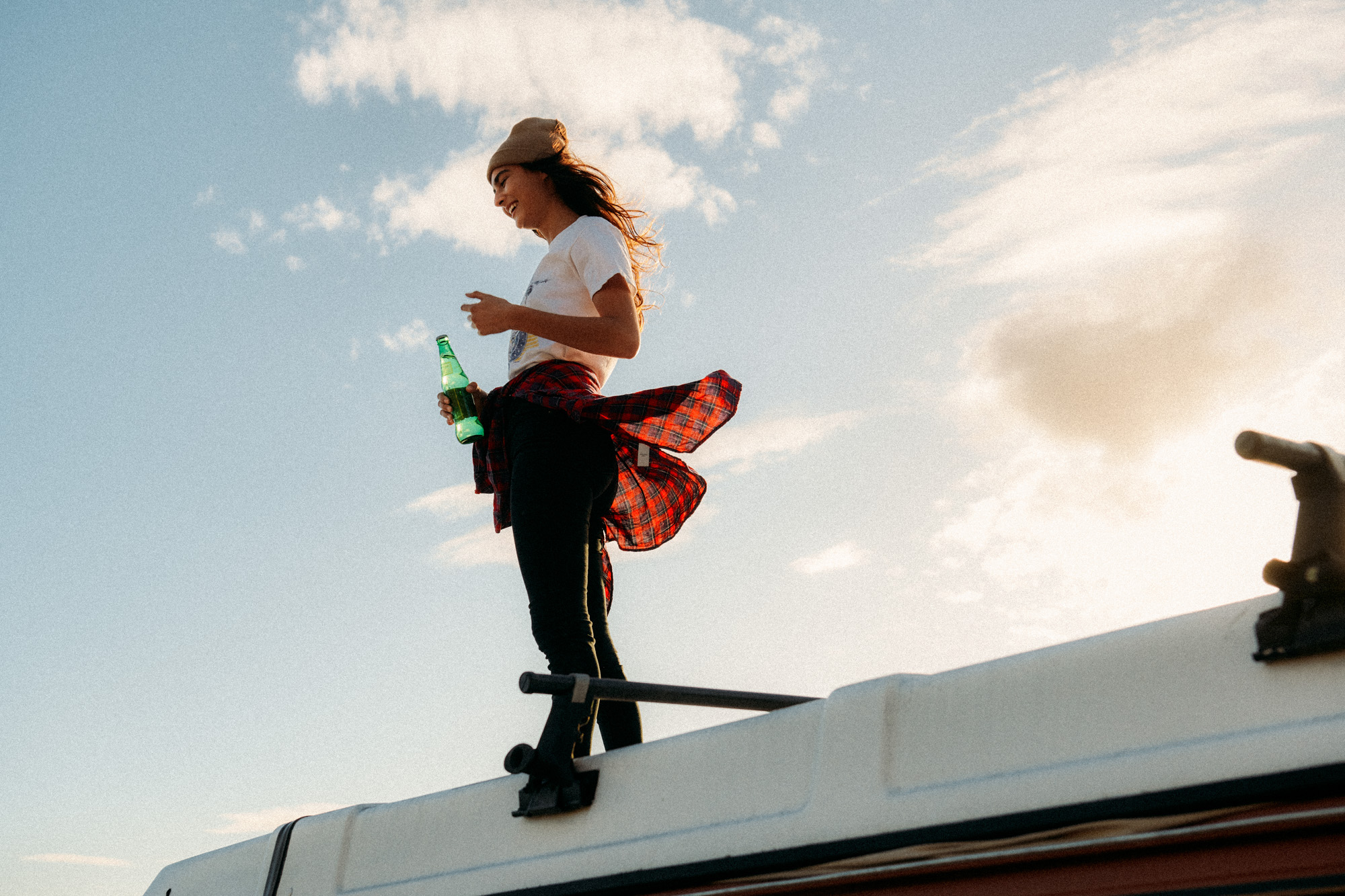 Lifestyle photographer Caleb Kuhl photographs beach sunsets with a Westfalia van