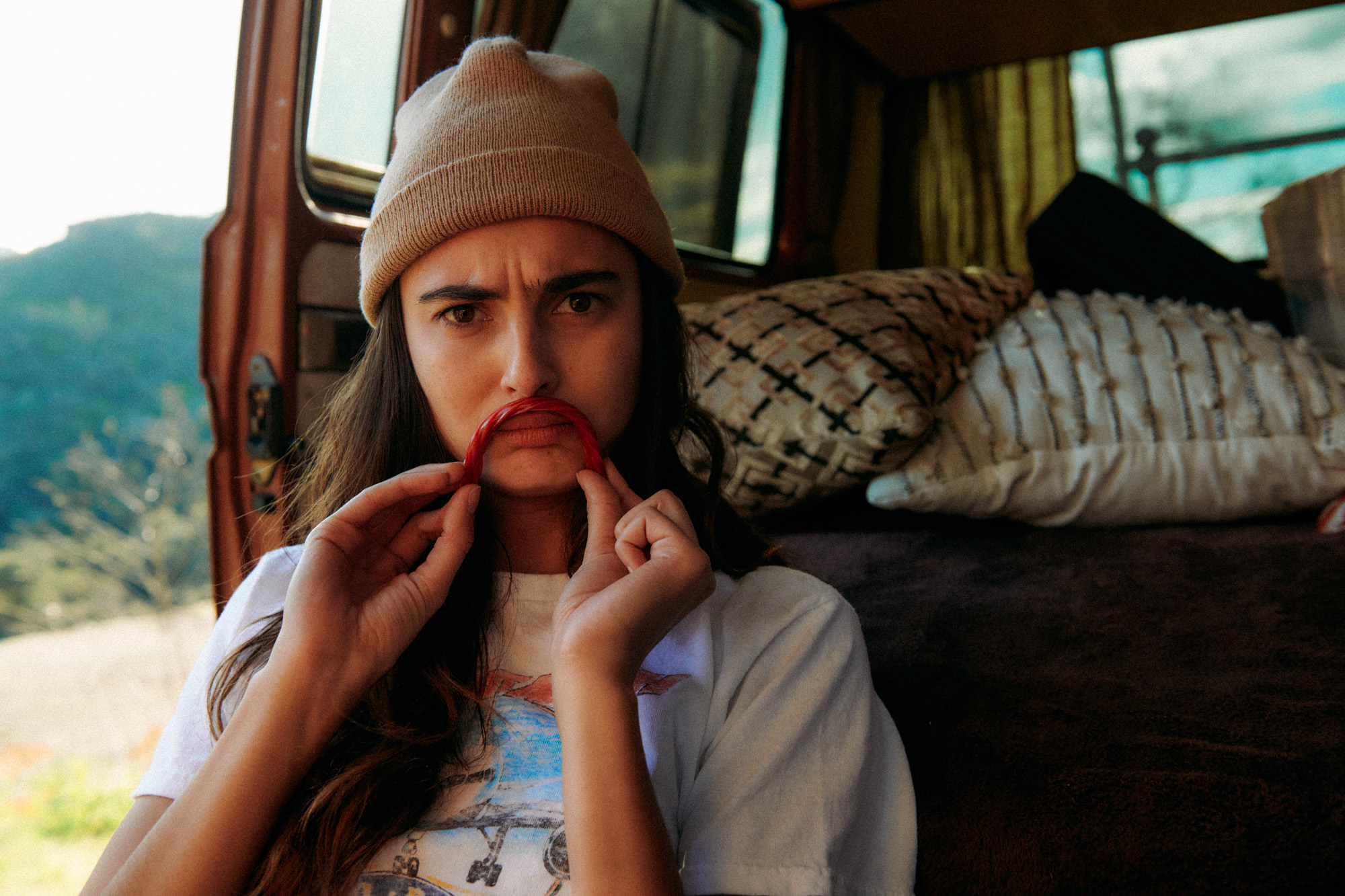 Lifestyle photographer Caleb Kuhl photographs beach sunsets with a Westfalia van