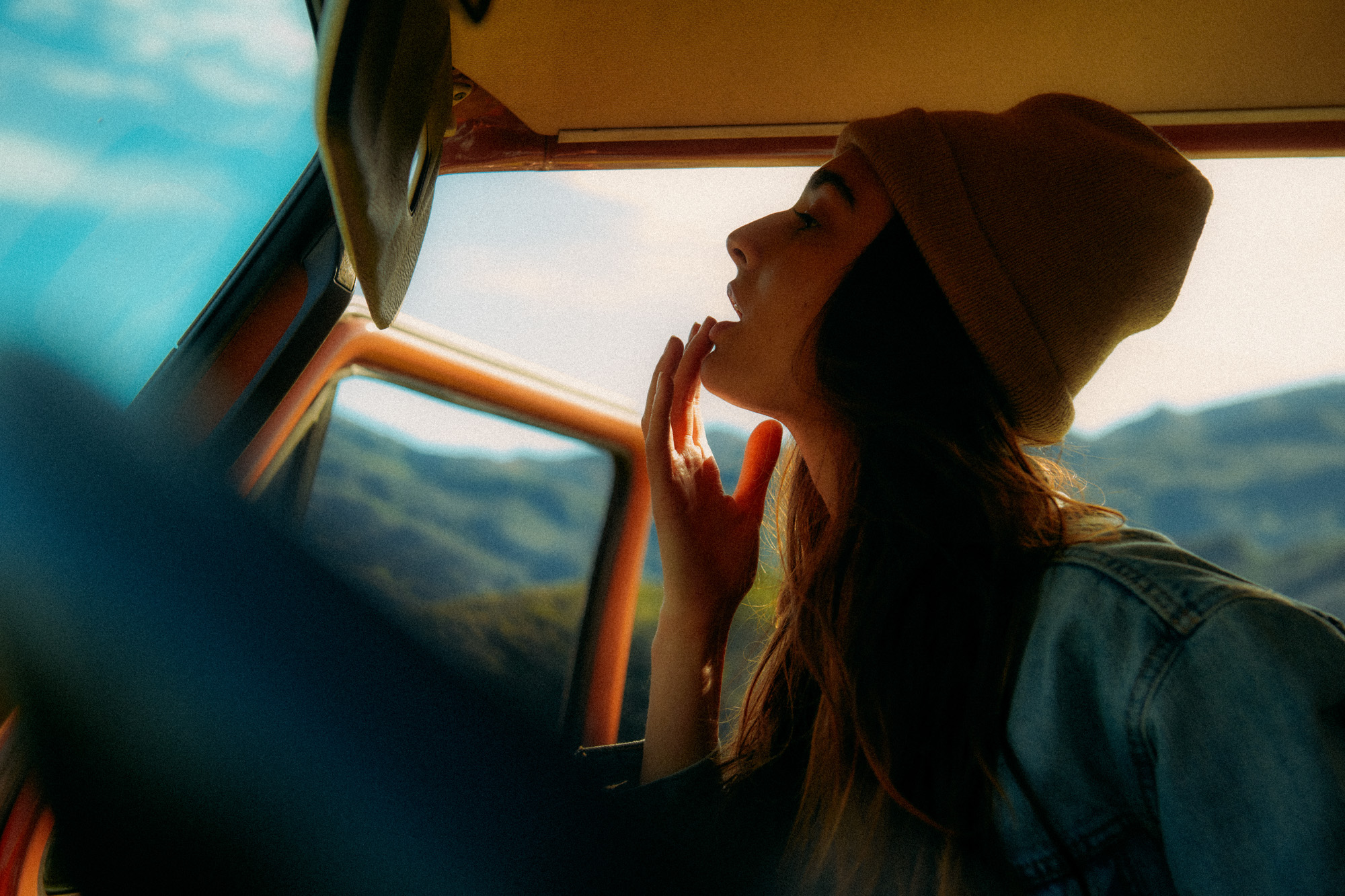Lifestyle photographer Caleb Kuhl photographs beach sunsets with a Westfalia van